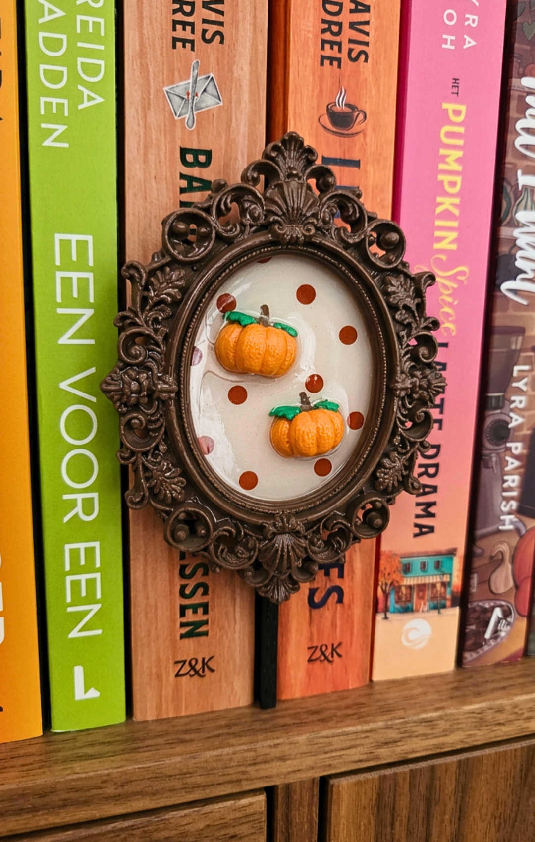 Bookshelve painting pumpkin